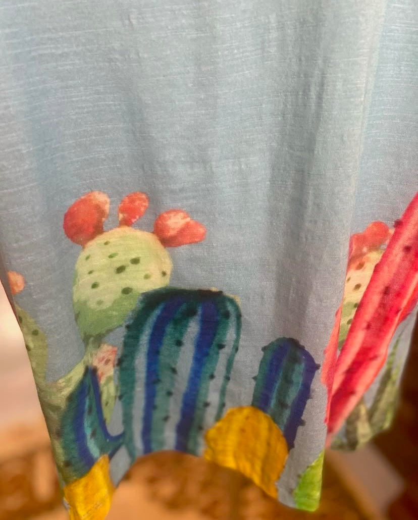 close up of colorful cactus print detail on cotton tee