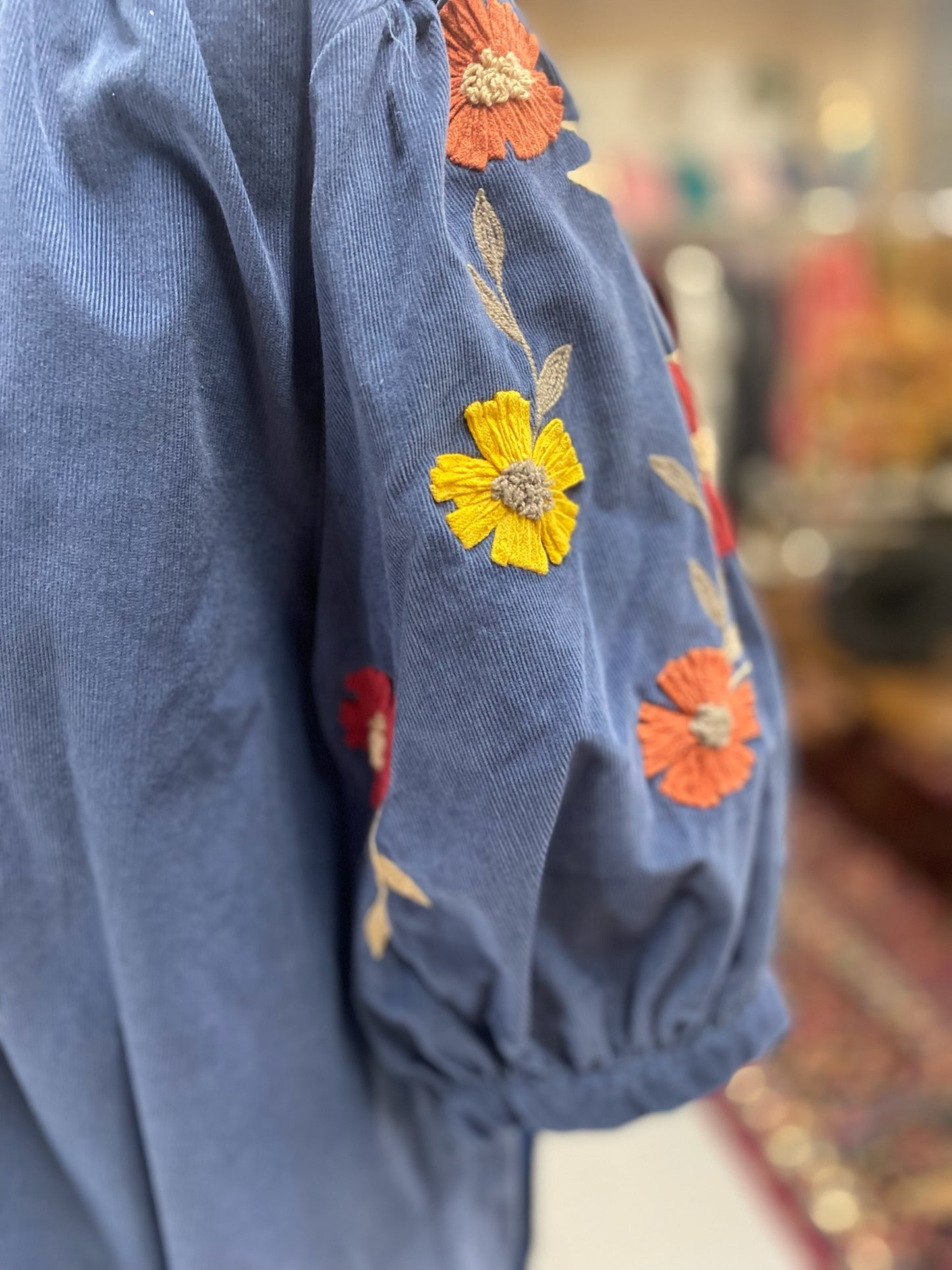 Margo Top in corduroy with needle point