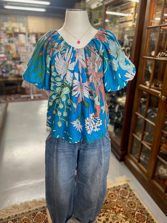 bold blue floral cotton top with puff sleeves and relaxed fit