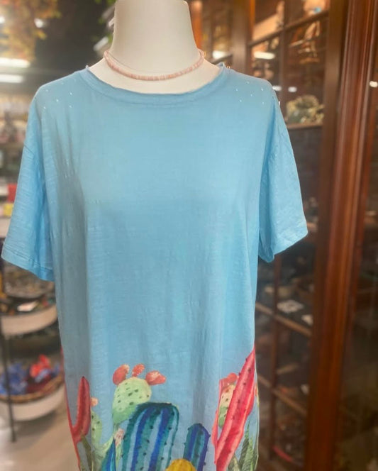 blue cotton t-shirt with cactus garden print at hemline on mannequin