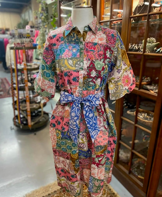 colorful floral patchwork midi dress with collared neckline and tie belt