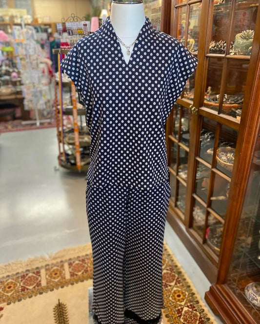 navy popover top with white geometric print and cap sleeves