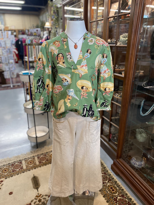 oyster colored slouch pocket pants with relaxed fit and wide leg style shown on mannequin
