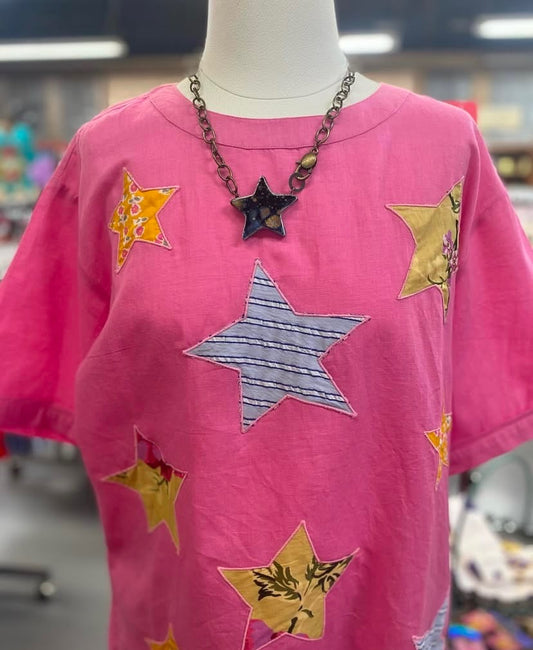 pink cotton linen top with multicolor star appliqués on front