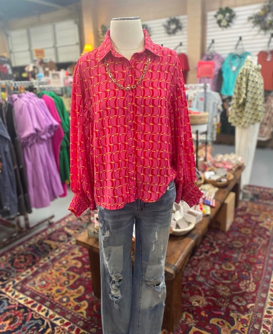 long sleeve red and pink swirl top with balloon sleeves and button front