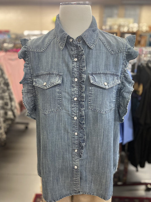 denim sleeveless button up top with ruffles and pearl snaps on mannequin